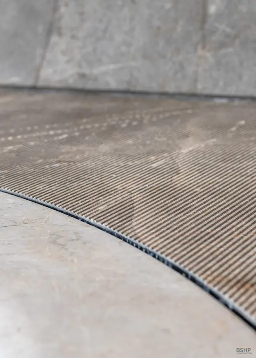 Ribbed stone floor detail in the spa