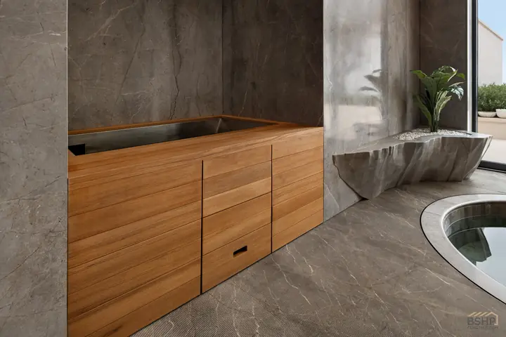 Teak credenza and monolithic carved stone basin in the spa